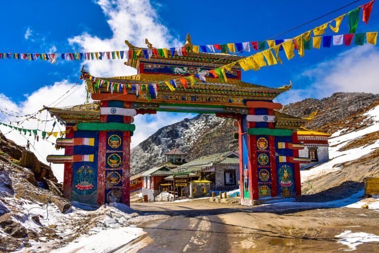 now-covered Sela Pass in Arunachal Pradesh with panoramic Himalayan views